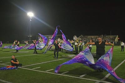 The color guard and marching guard at halftime. 
