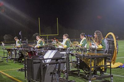 The drumline started off halftime. 