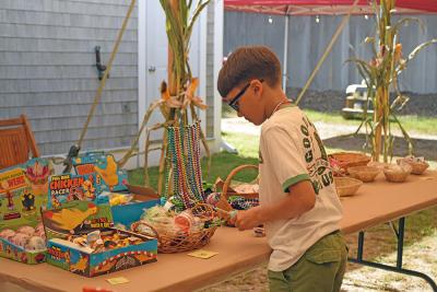 Daniel, 9, explores some of the prizes. 