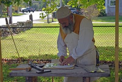 John Garcia shows engraving techniques. 
