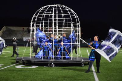 The color guard inside the cage. 