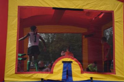 The kids enjoyed the bounce house. 