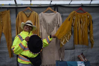 Patricia S'Ochepo Sutton with the traditional clothing she makes. 