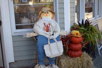 A scarecrow in a lobster sweater from Treasures and Co. 