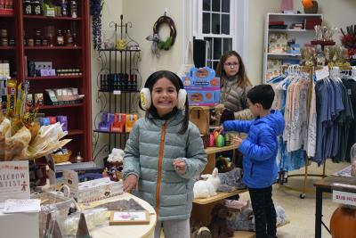 Vera (10,) Joey (5) and Sydney (10) explore the candy store. 
