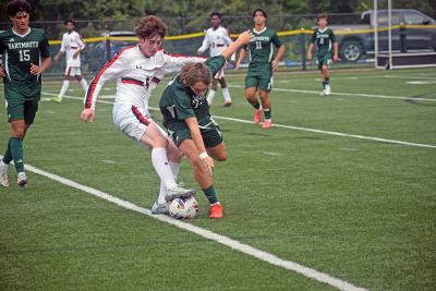 Logan Soares tries to get the ball. 