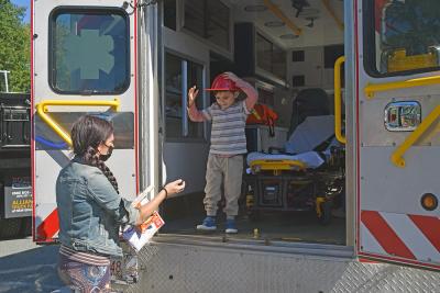JJ, age 5, explores the ambulance. 