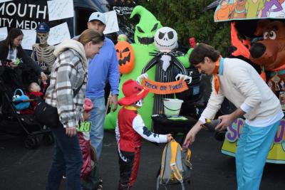 'Fred' of the Mystery Gang hands out candy. 