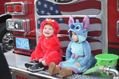 Wesley (2) and Taytum (1.5) dressed up as Elmo and Stitch. 