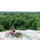 A dirtbike rider poses atop a rock formation at Freetown-Fall River State Forest. COURTESY ANTHONY FRANCO