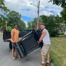 Jared Holmes and Jared burns moving items at a job.