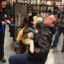 Atlas gives Rob Ruttenberg a hug and kiss.