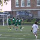 Lucas Macedo, Logan Stott, Luke Fern and Caleb DaSilva block a penalty kick. 