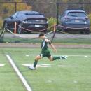 Andrew Catulo kicks the ball. 