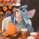 Josia Raposa paints a pumpkin.  Josia Raposa paints a pumpkin.