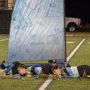 Laying beneath a "sailboat." s