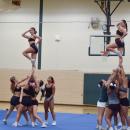 Taylor Beauparland and Cecelia Trahan pose in a stunt. Photos by Kat Sheridan