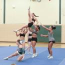 Cecelia Trahan does a split stunt. 