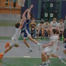 Julian Raymond blocks another player. Photos by Kat Sheridan