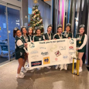 The team poses with their sponsors. Source: Katie Nicholson