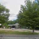The three-component project would be located at 411 Faunce Corner Road where Rose Motors used to be. Source: Google Maps