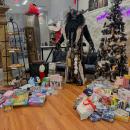 Krampus poses with all the toys raised. Photos by Kat Sheridan
