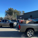 Two of the three trucks filled with toys.
