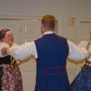 A trio of dancers spin around.