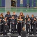 The chorus carols for the season.