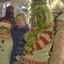 Amelie and Colby Philp pose with the Grinch.