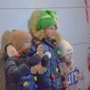 Johnny (4), Eliza (6) and Claira (3) get their photo taken at the selfie spot.