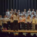 Students perform with boom whackers and hand drums. Photo by Kat Sheridan