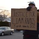 A sign calling for justice for the arrested 5-year-old. 
