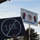 A couple of signs against I.C.E.