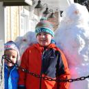 Jack and William Hurson pose with their snowmen outside of Farm and Coast.