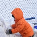 Sage Paiva, 2, plays in the snow.