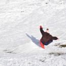 Penelope Vertentes, 10, flies over the ramp she built.