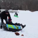 Frank Polverino III pushes Frank Polverino IV down the hill in his sled.