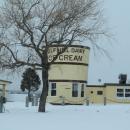 Gulf Hill Dairy surrounded by snow.