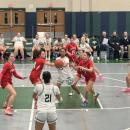Nia Barnes tosses the ball to Taeya Burgo. 
