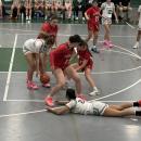 Taeya Burgo tosses the ball to Kyleigh Fredette. 