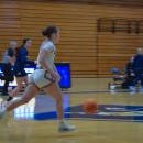 Melanie DeMeo dribbles the ball.