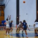 Yasmine Santos throws a foul throw. 