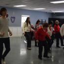 Students and members of the Council on Aging dance together. Photos by Kat Sheridan