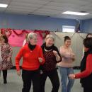 Some members of the council enjoy the dance.
