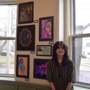 Kai Dixon with his art.