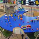 The Legos with a chair thrown by the leprechaun.