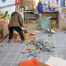 A mess left in the reading section of the classroom.