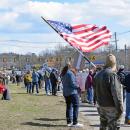 The American flag waves in front of the crowd. Photos by Kat Sheridan