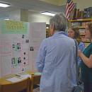 Students present their project on adding a women's studies class to the curriculum. 